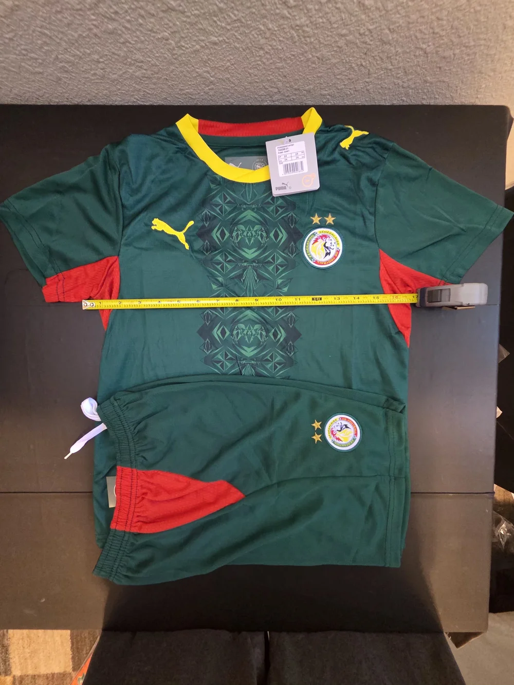 Puma Kids Green Jersey and Shorts Set with Red & Yellow Accents